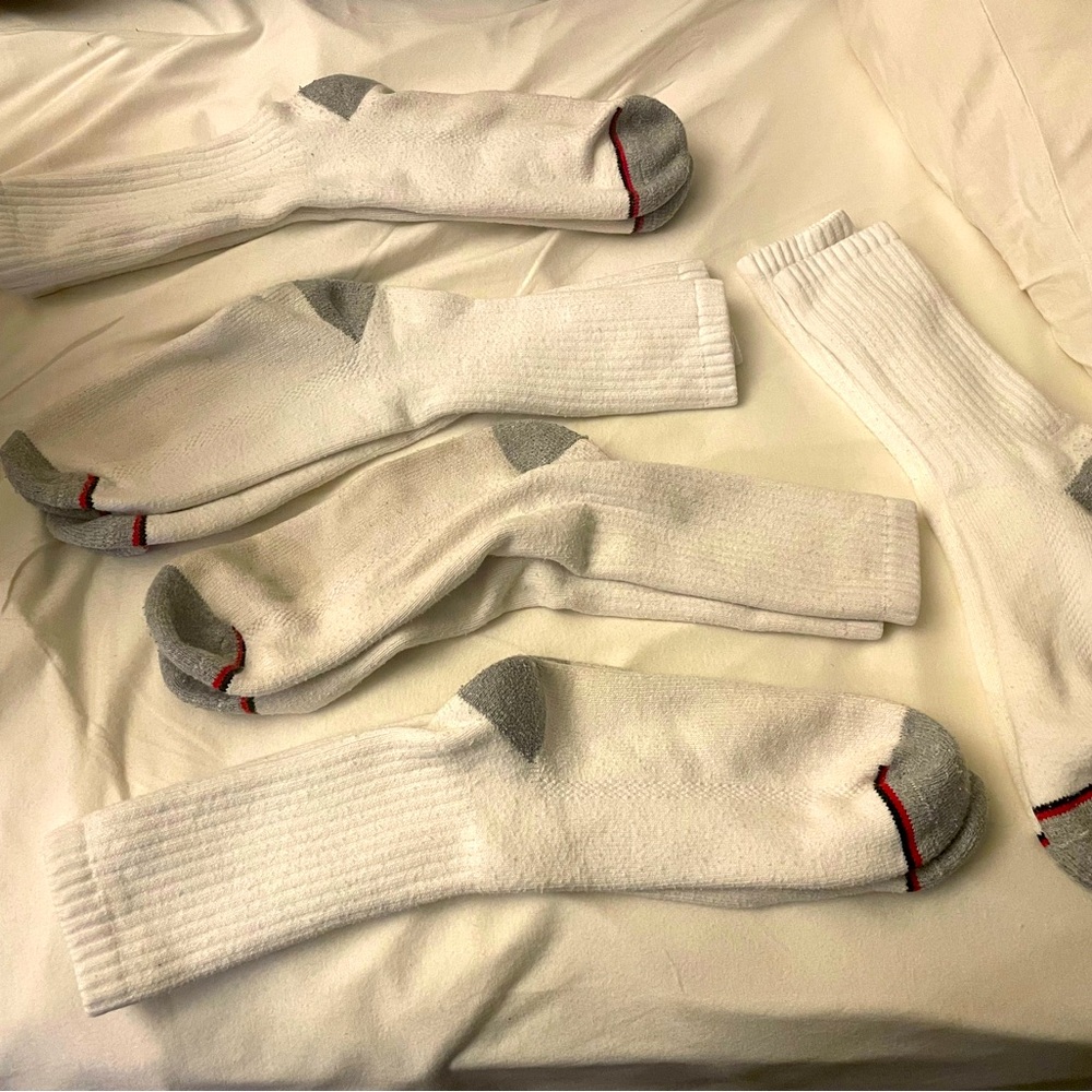White calf socks with grey coloring on toe